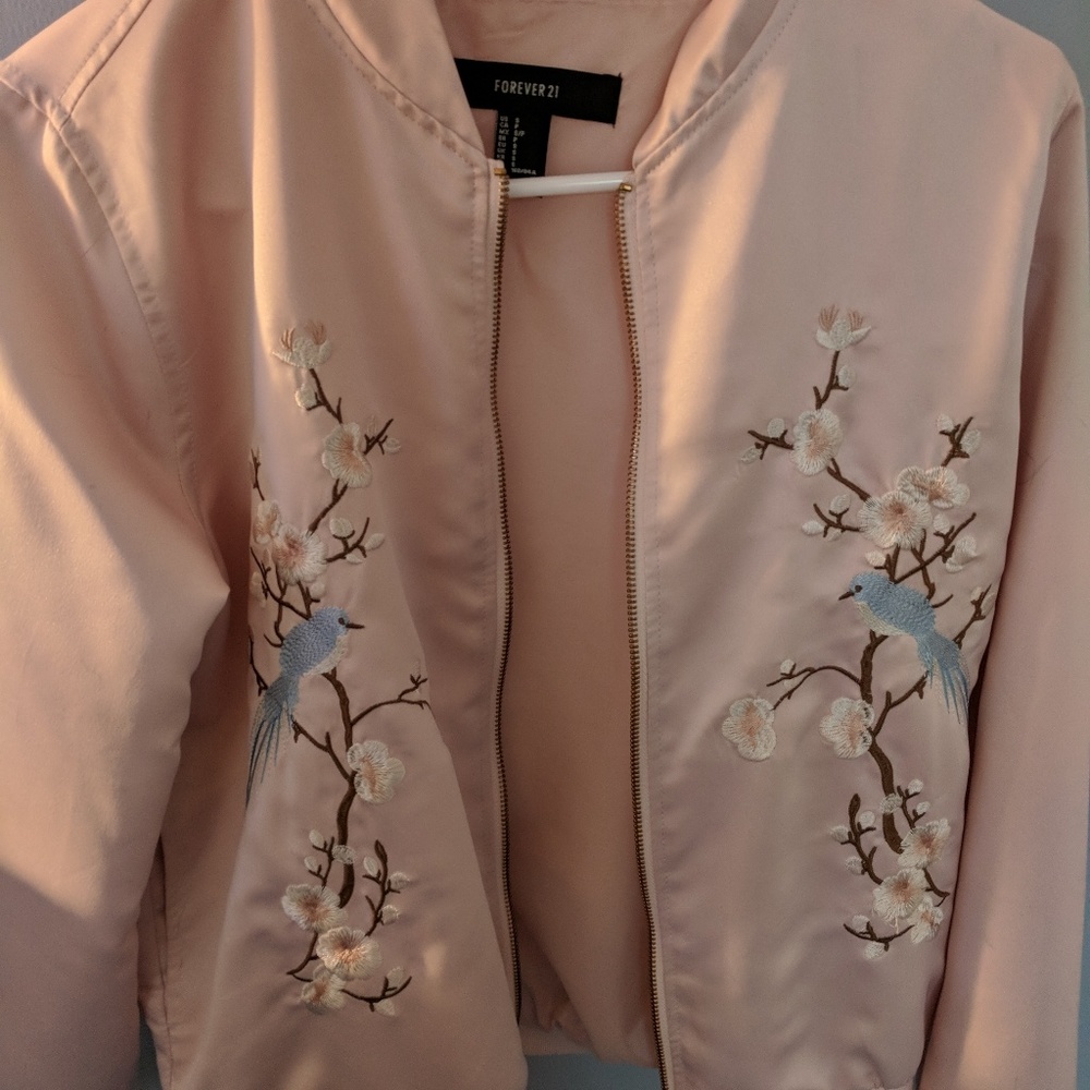 Blush bomber jacket with floral embroidery